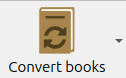 a brown button with two curving arrows on it and the words Convert books below it